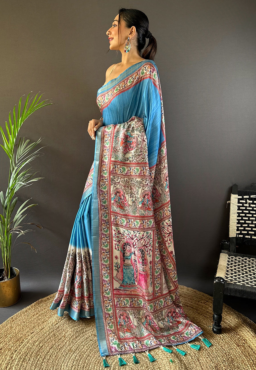 Curious blue tussar silk madhubani printed saree with zari woven border
