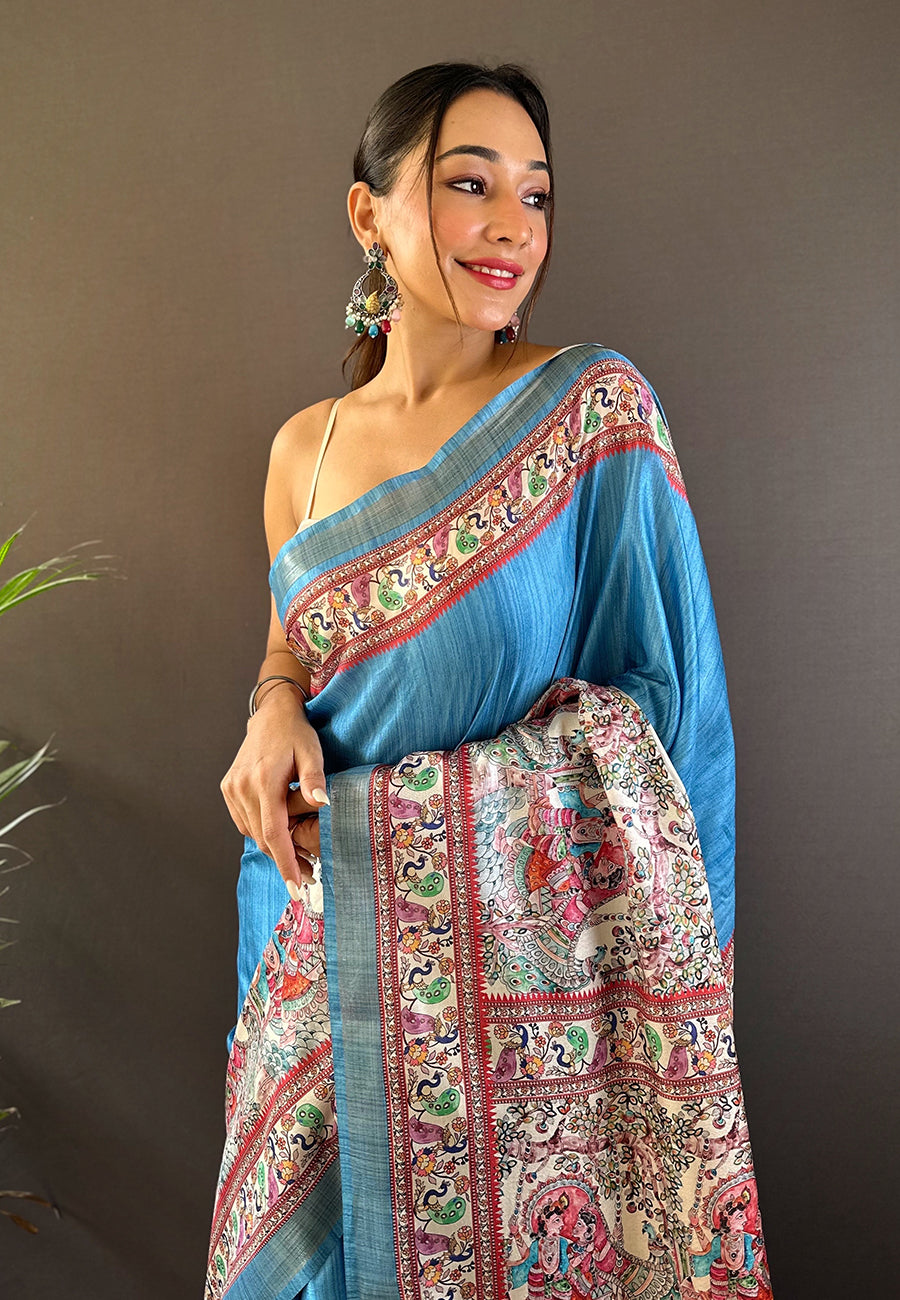 Curious blue tussar silk madhubani printed saree with zari woven border