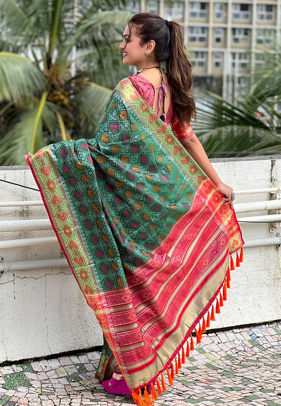 Green soft patola silk meenakari zari woven saree