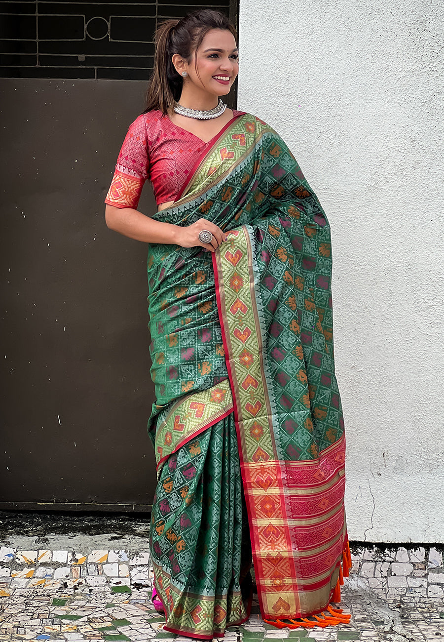 Green soft patola silk meenakari zari woven saree