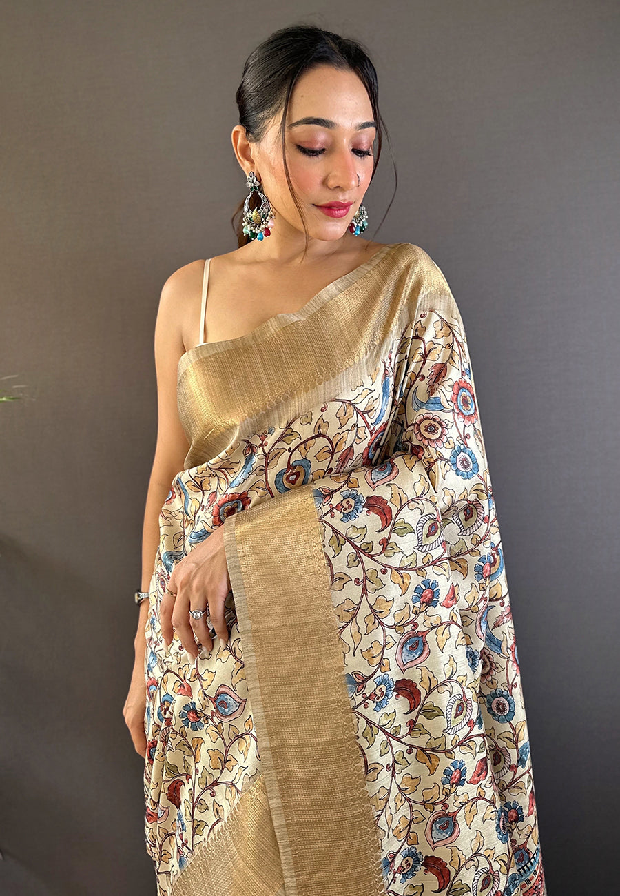 Cream assam silk kalamkari printed saree with zari woven border