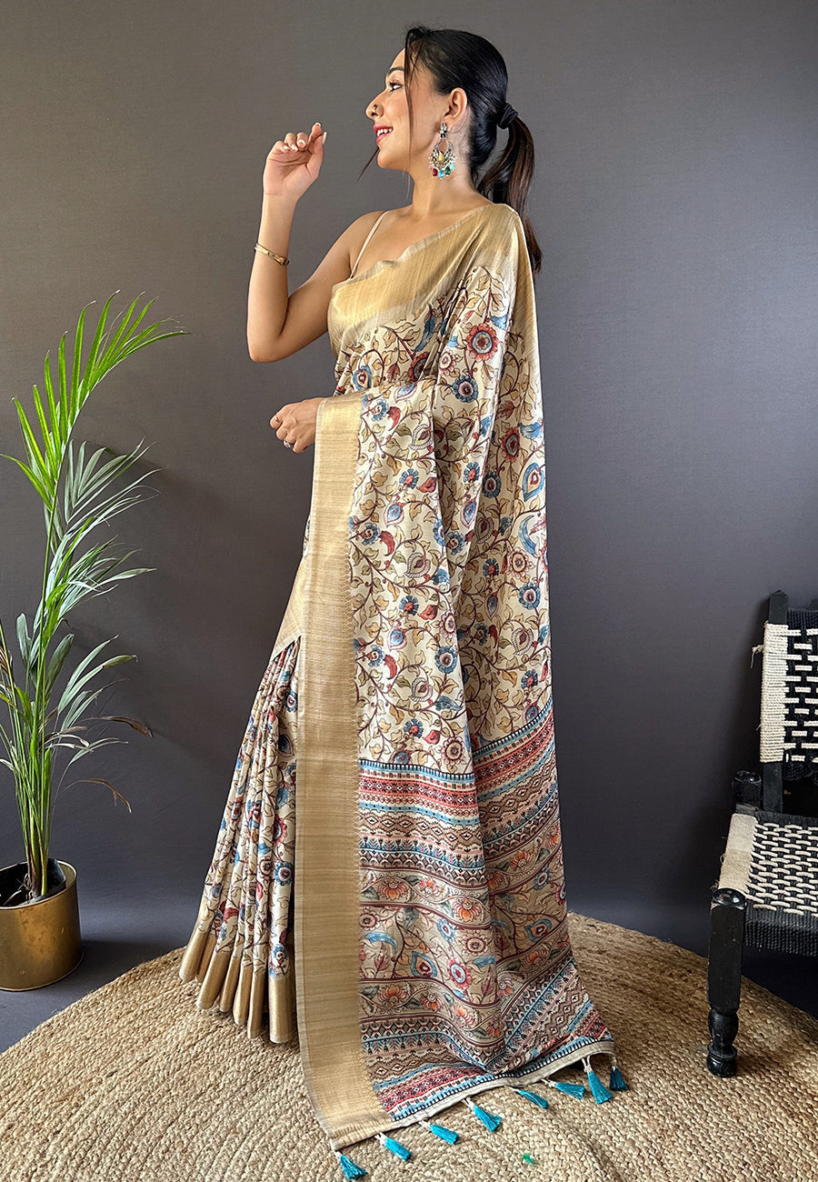 Cream assam silk kalamkari printed saree with zari woven border