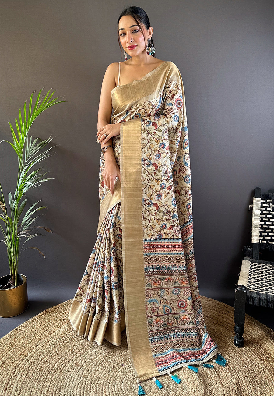 Cream assam silk kalamkari printed saree with zari woven border