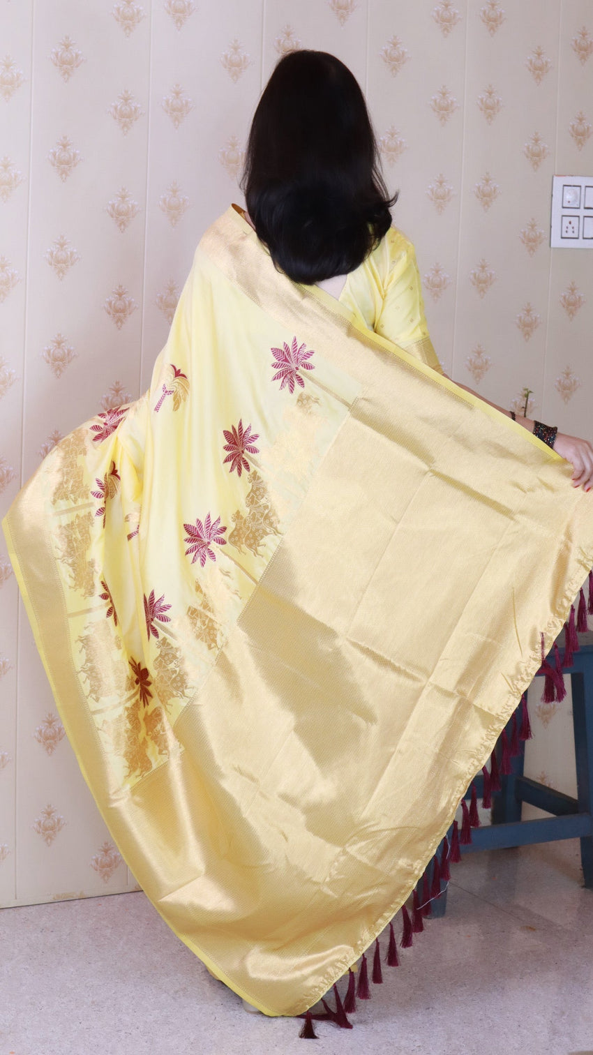 Light yellow soft silk saree with kamdhenu weaves zari woven saree