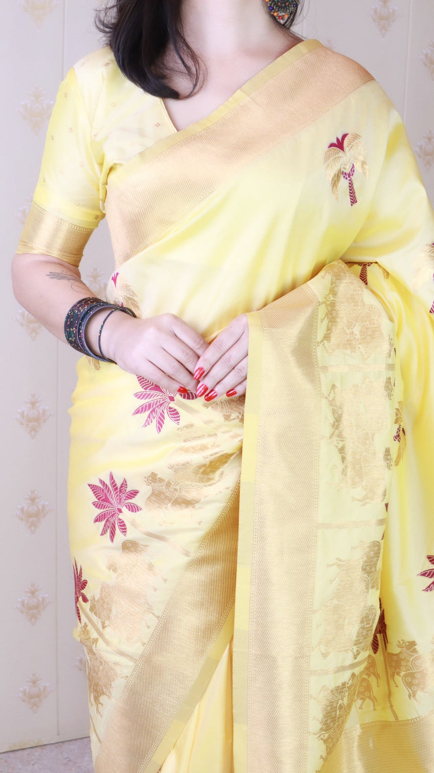 Light yellow soft silk saree with kamdhenu weaves zari woven saree