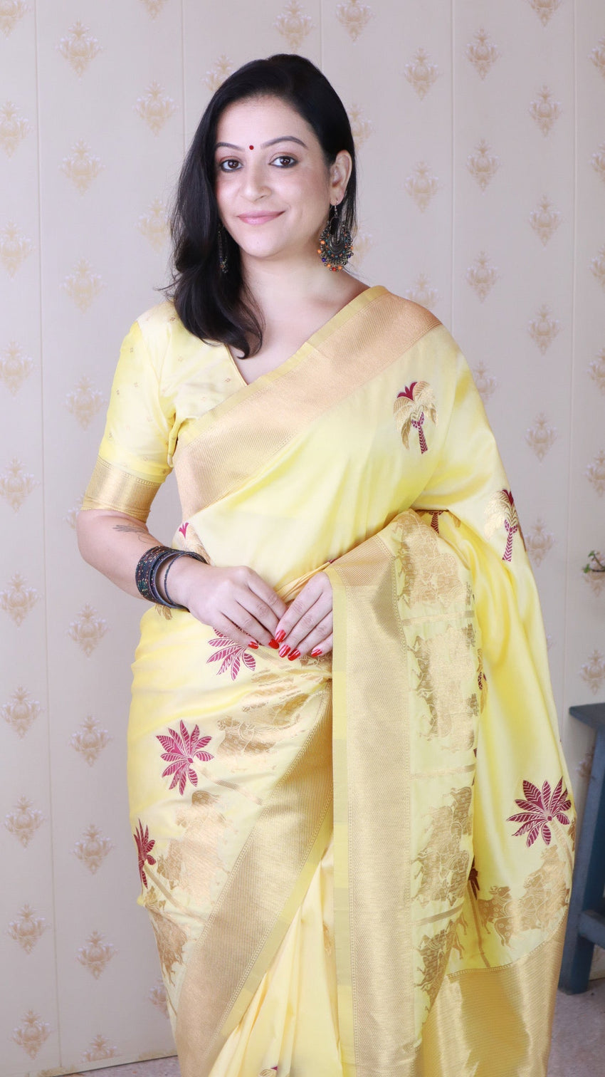 Light yellow soft silk saree with kamdhenu weaves zari woven saree