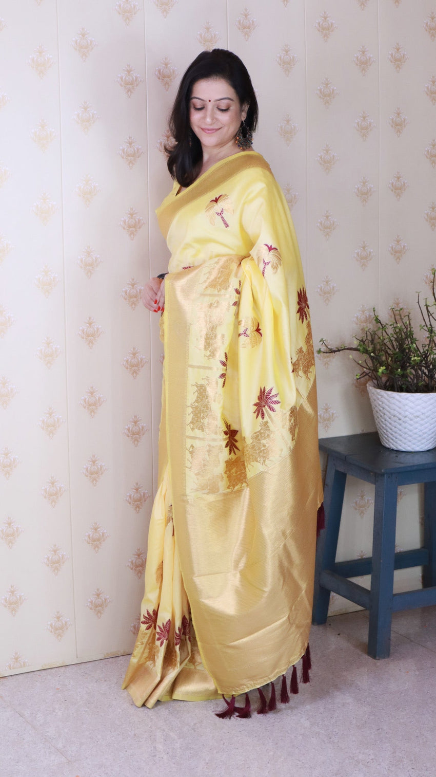 Light yellow soft silk saree with kamdhenu weaves zari woven saree