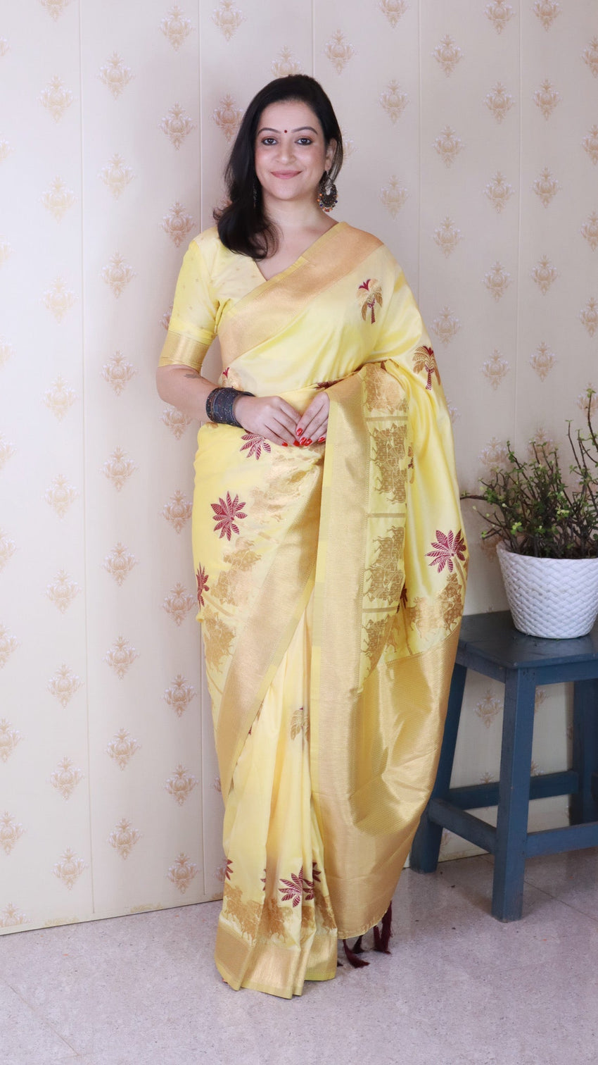Light yellow soft silk saree with kamdhenu weaves zari woven saree