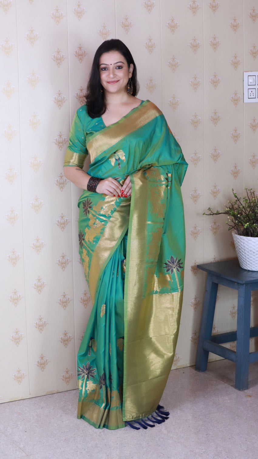 Green soft silk saree with kamdhenu weaves zari woven saree