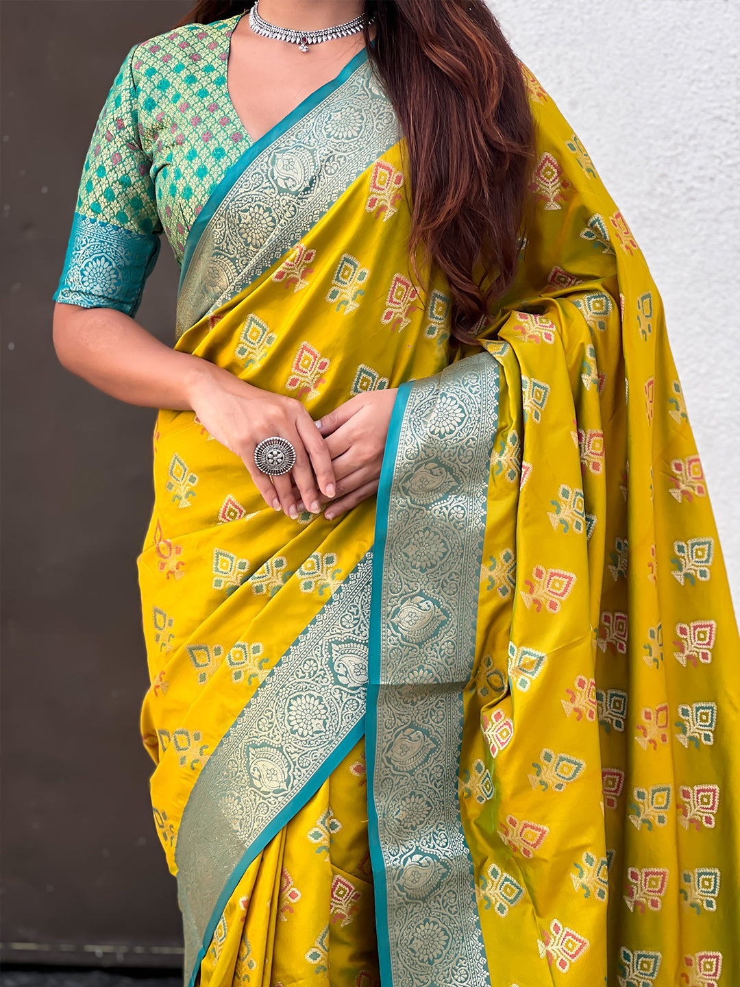 Mehendi green soft silk zari woven ikkat patola saree with contrast weaves