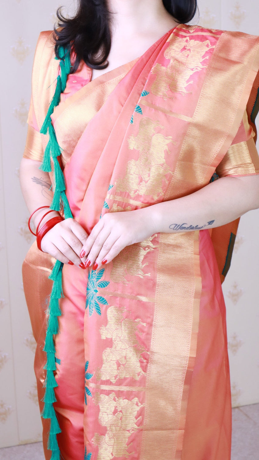 Peach soft silk saree with kamdhenu weaves zari woven saree