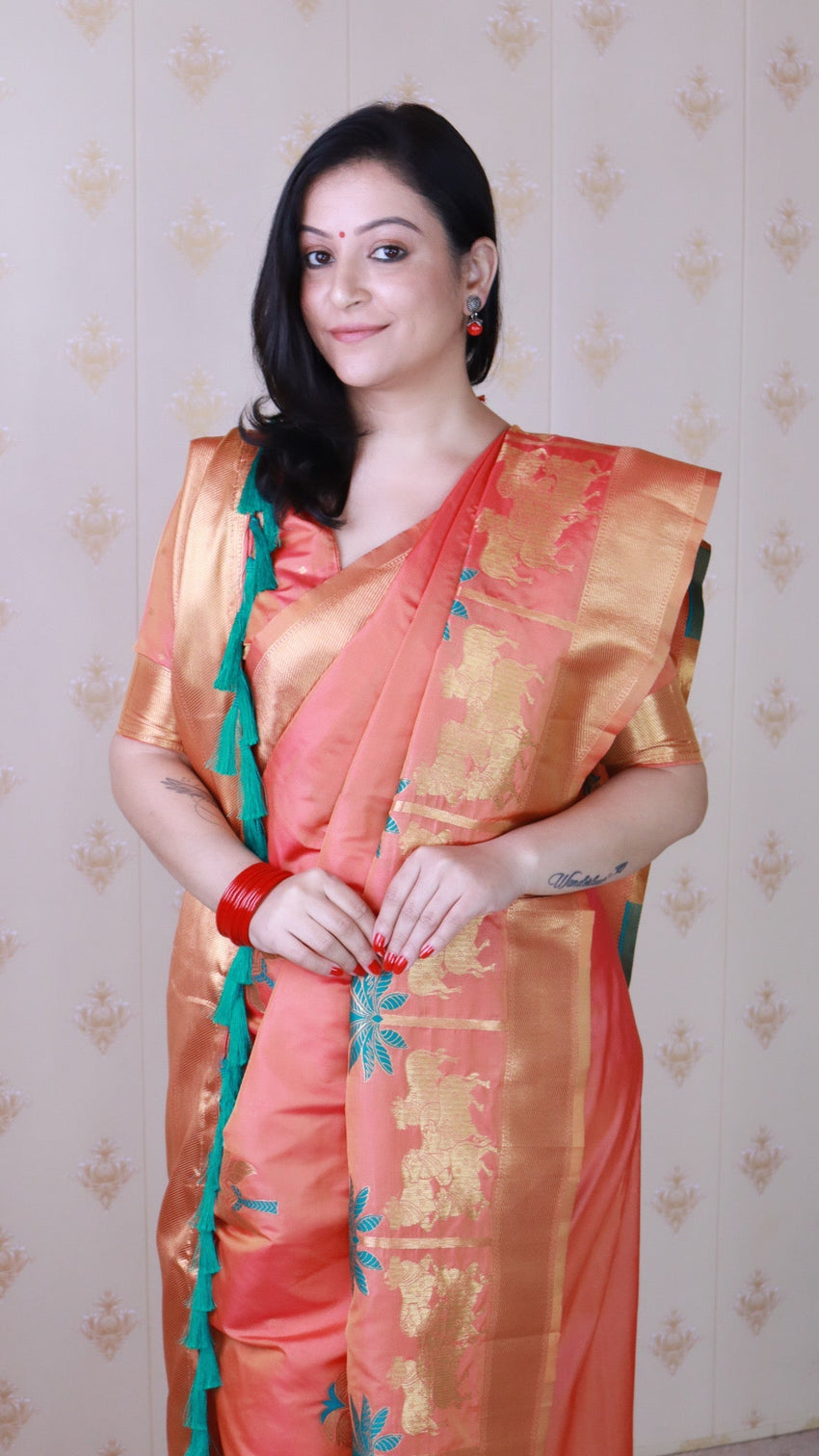 Peach soft silk saree with kamdhenu weaves zari woven saree