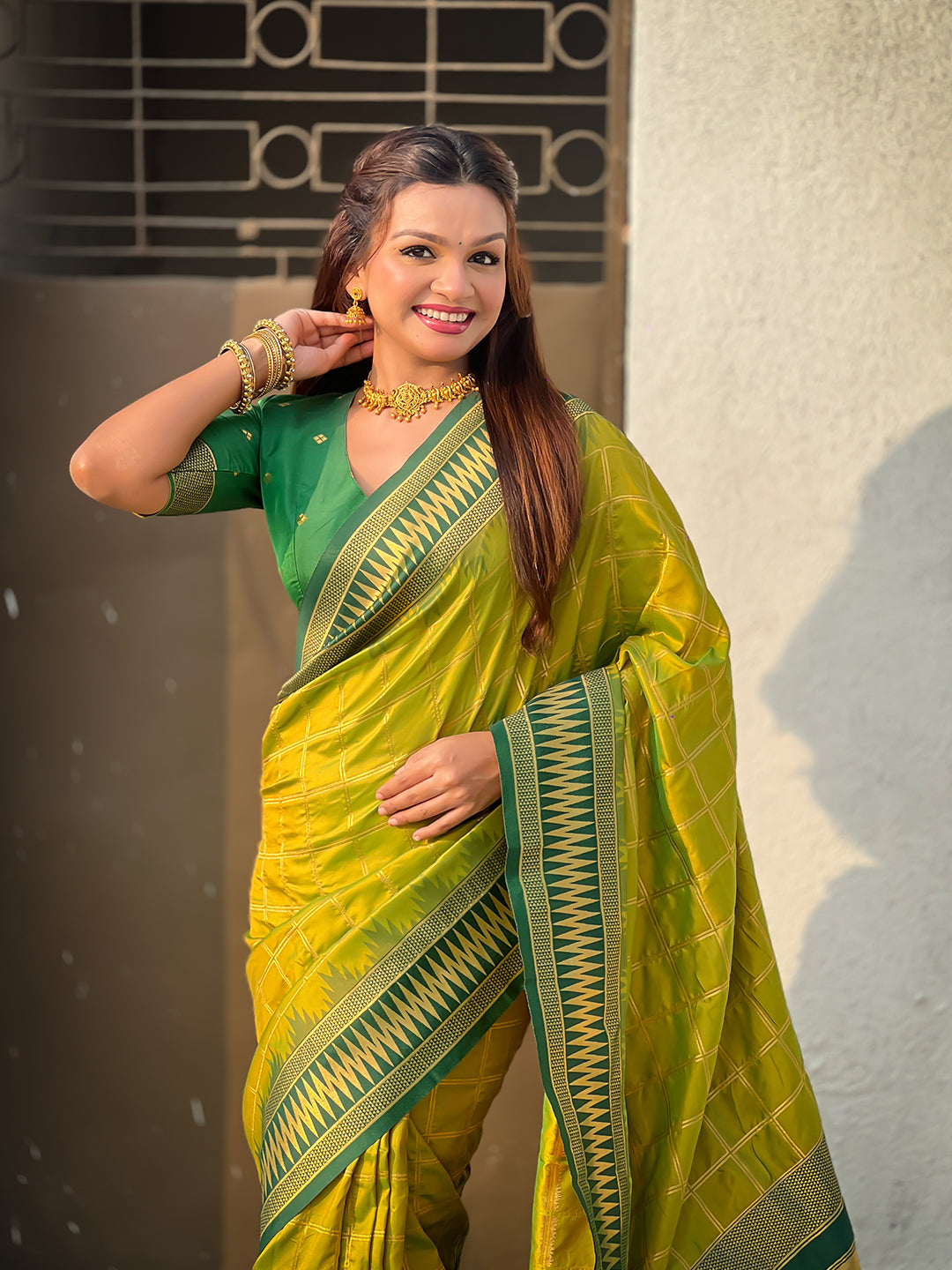 Mehendi green soft silk checks traditional zari contrast woven saree