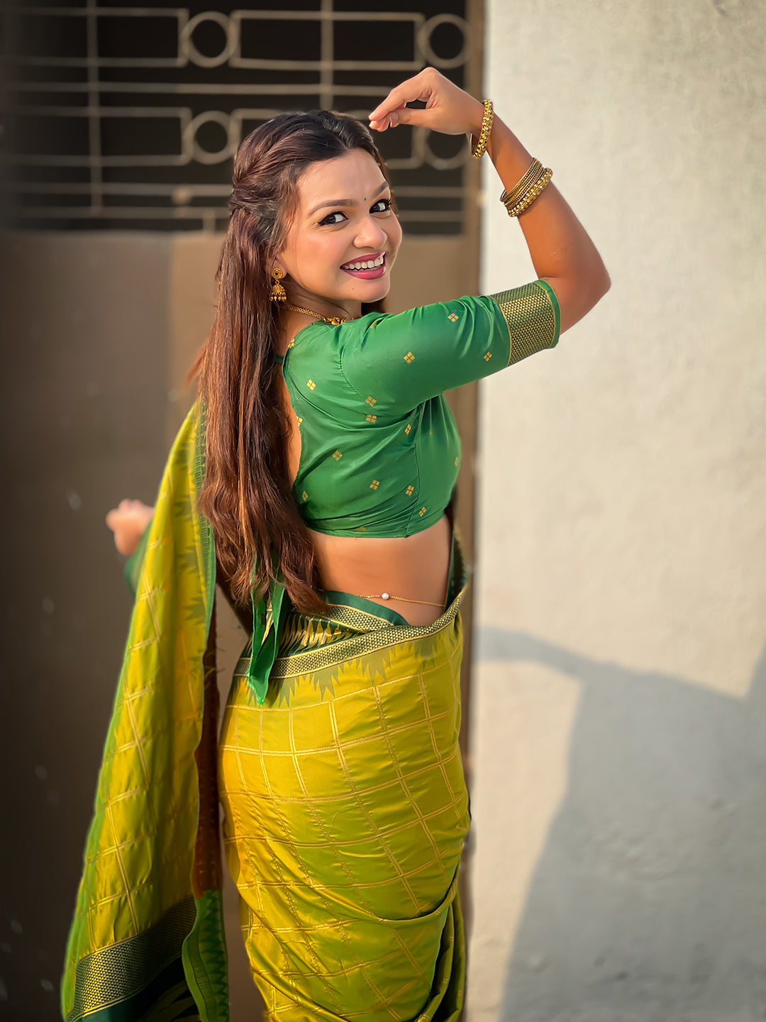 Mehendi green soft silk checks traditional zari contrast woven saree