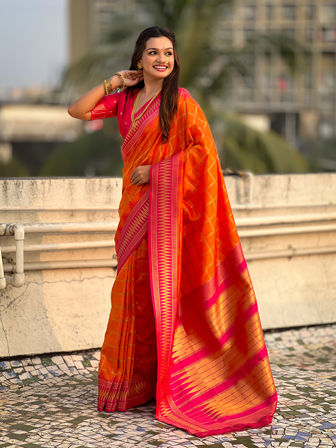 Orange soft silk checks traditional zari contrast woven saree