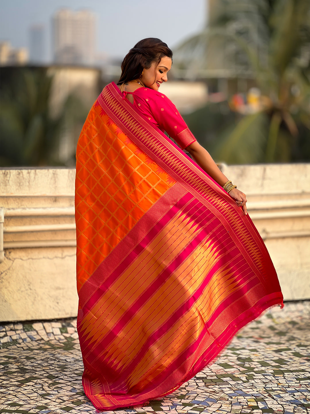 Orange soft silk checks traditional zari contrast woven saree