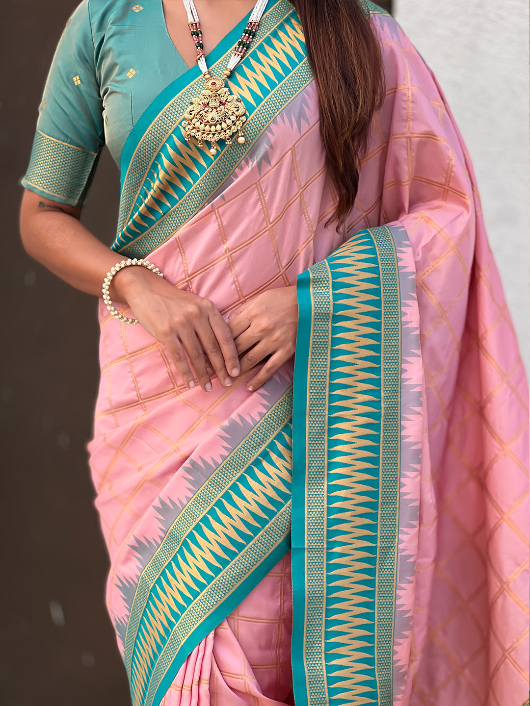 Baby pink soft silk checks traditional zari contrast woven saree
