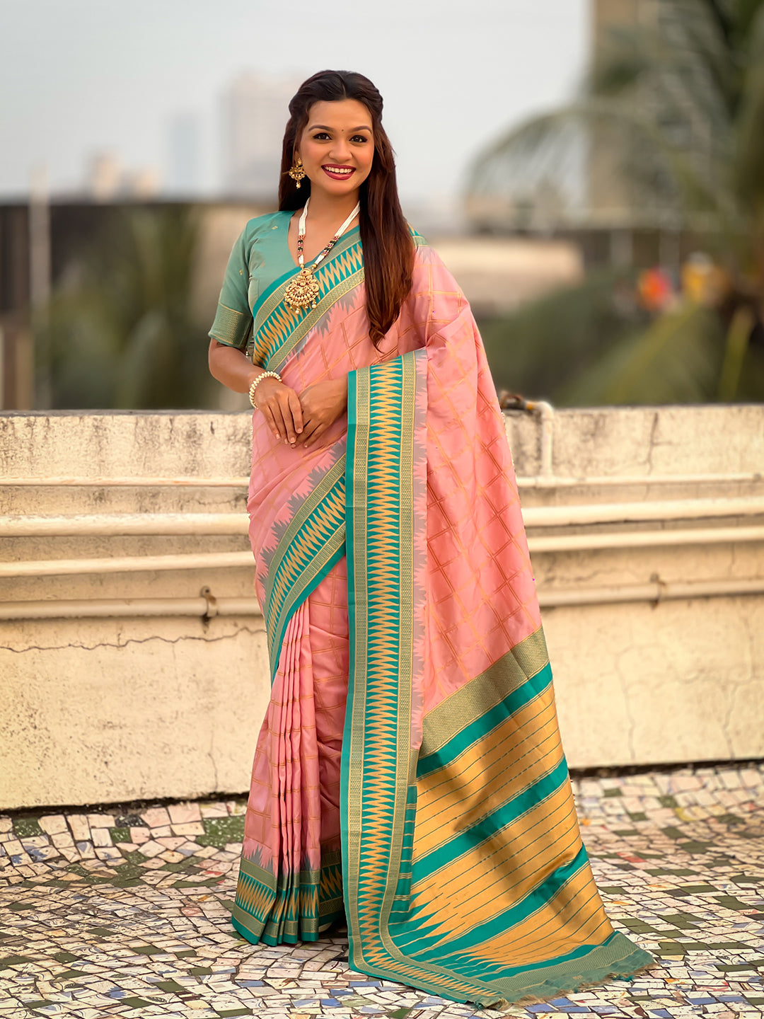 Baby pink soft silk checks traditional zari contrast woven saree