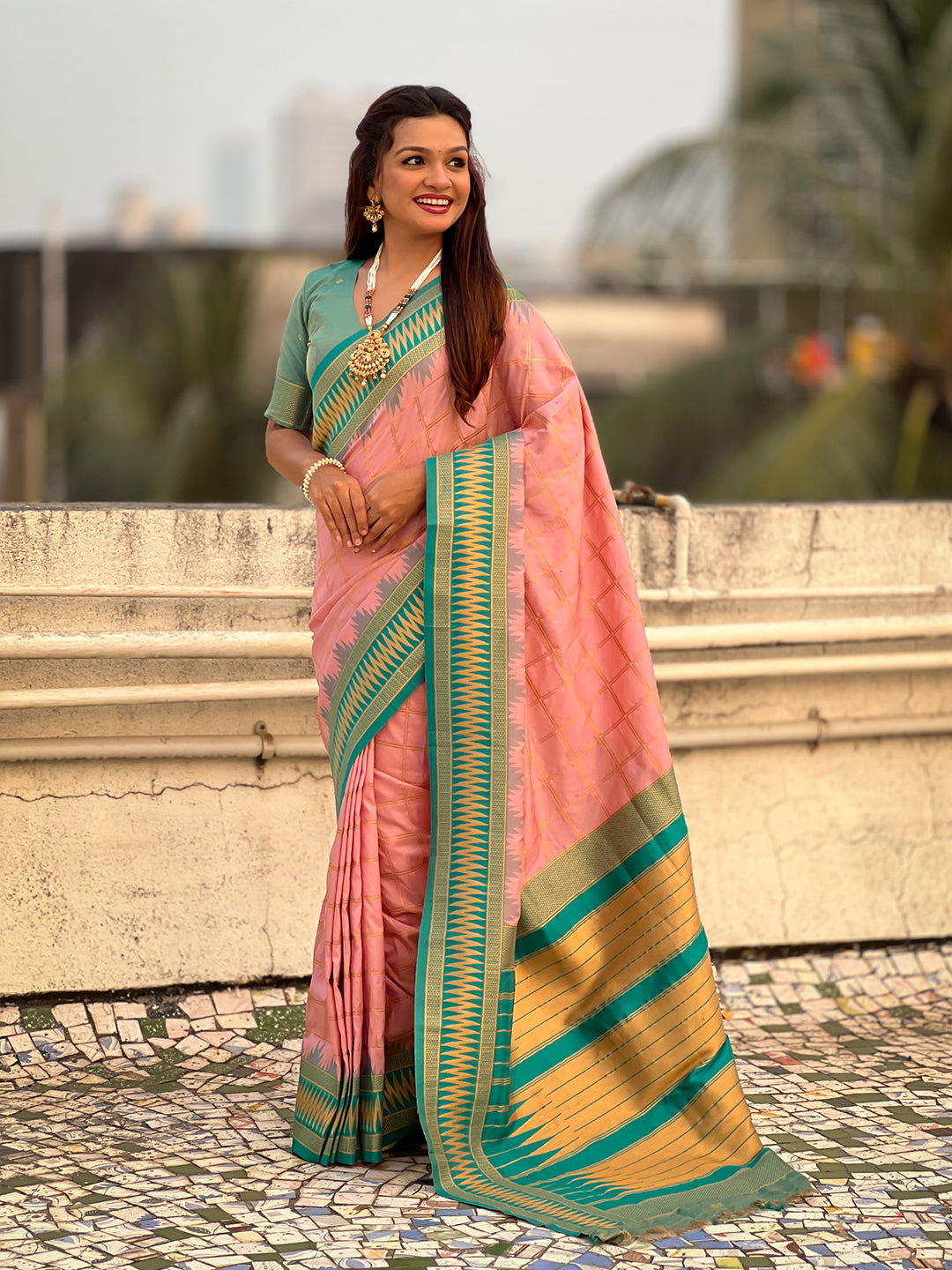 Baby pink soft silk checks traditional zari contrast woven saree