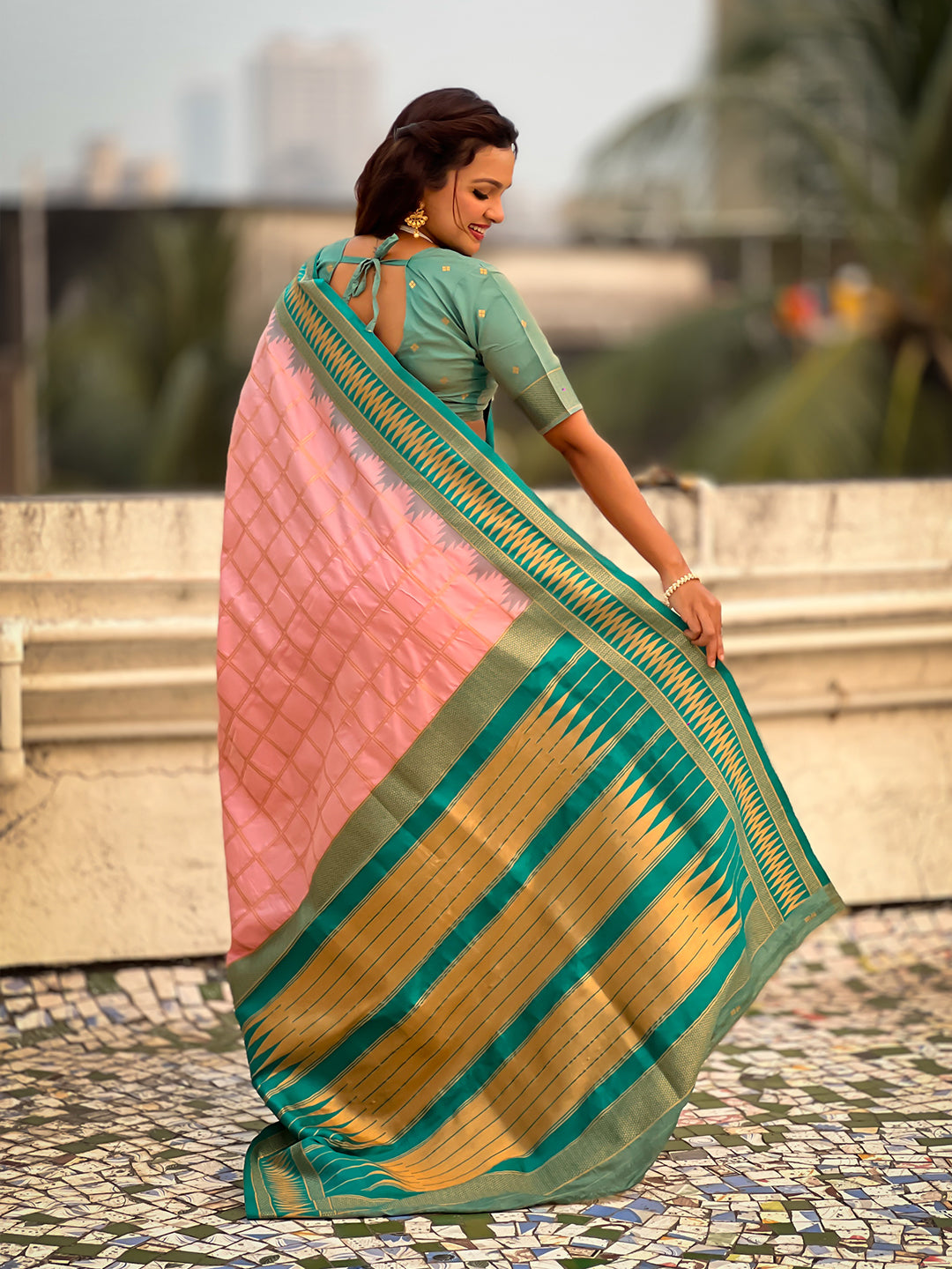 Baby pink soft silk checks traditional zari contrast woven saree