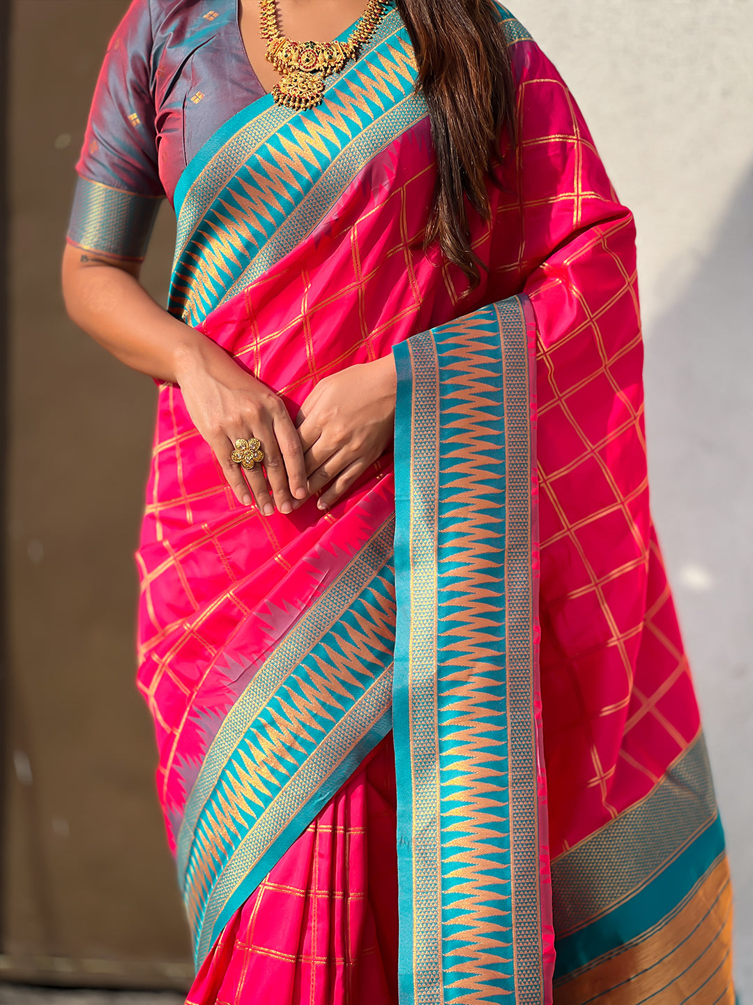 Pink soft silk checks traditional zari contrast woven saree
