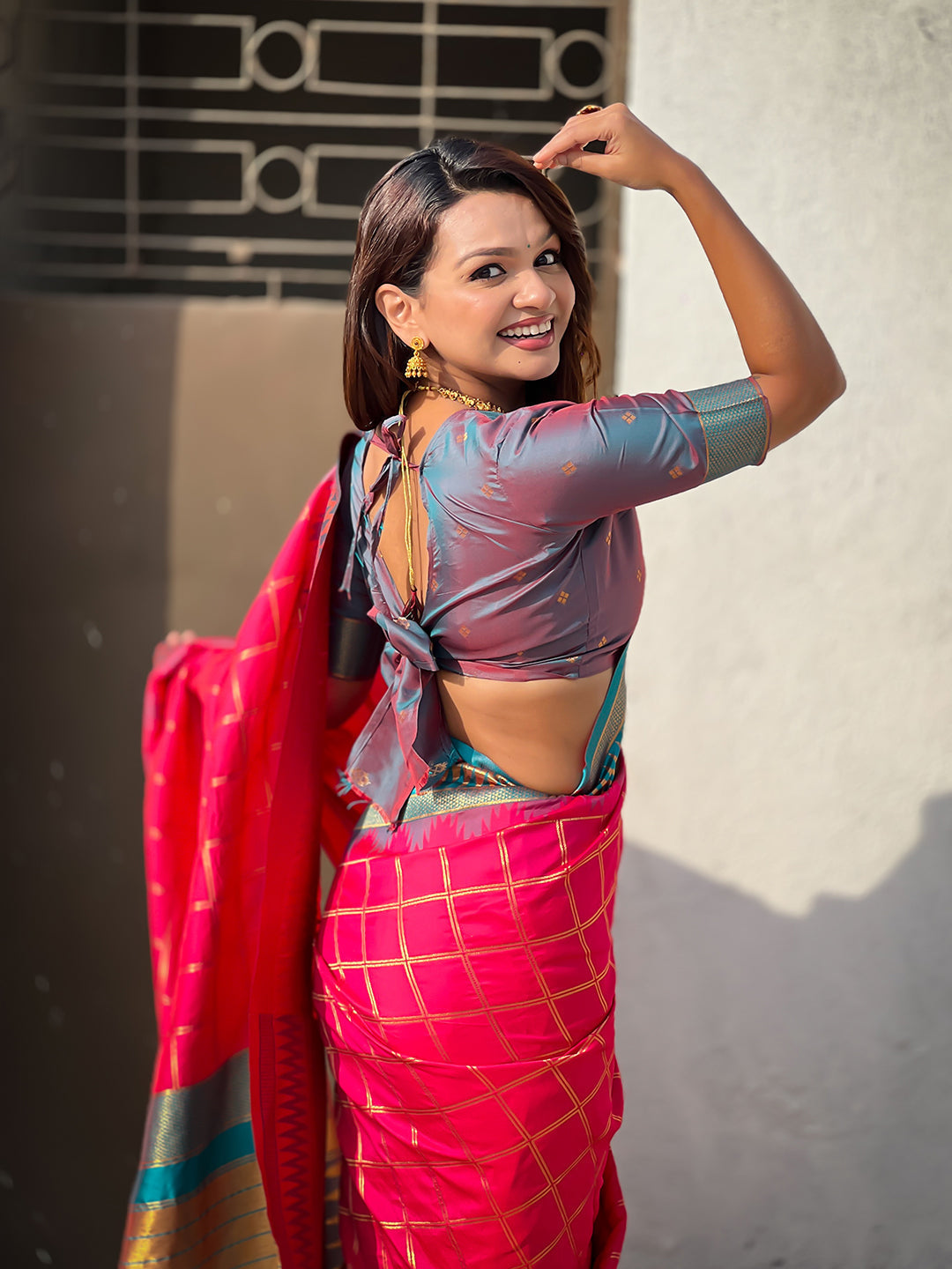 Pink soft silk checks traditional zari contrast woven saree