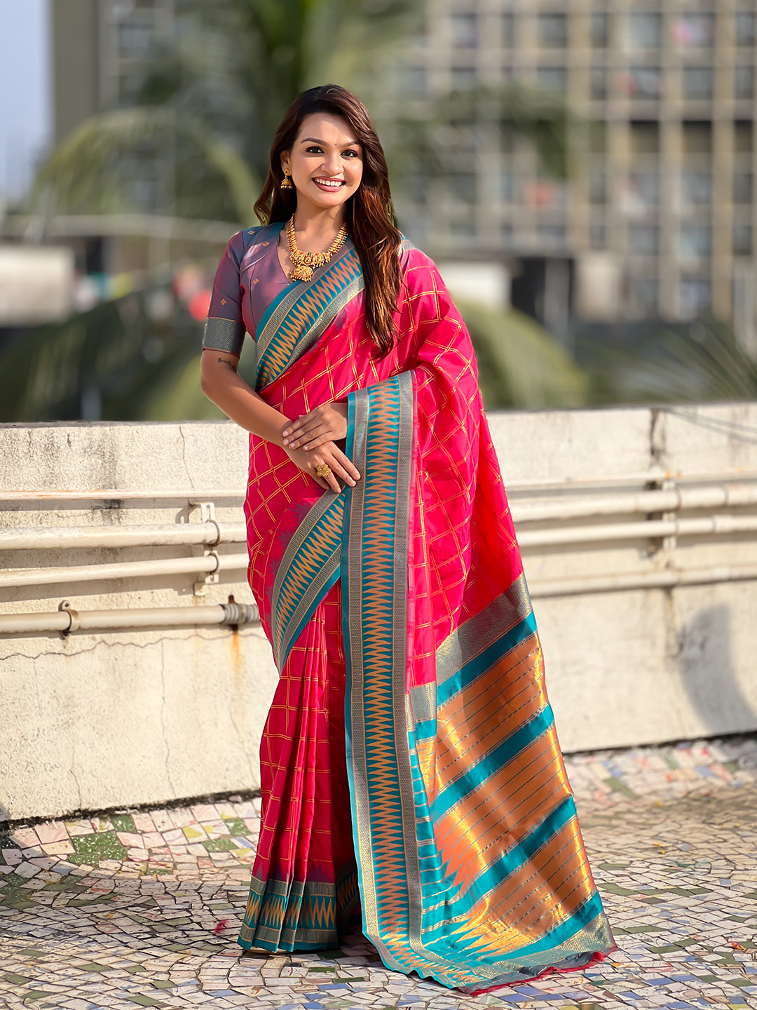 Pink soft silk checks traditional zari contrast woven saree