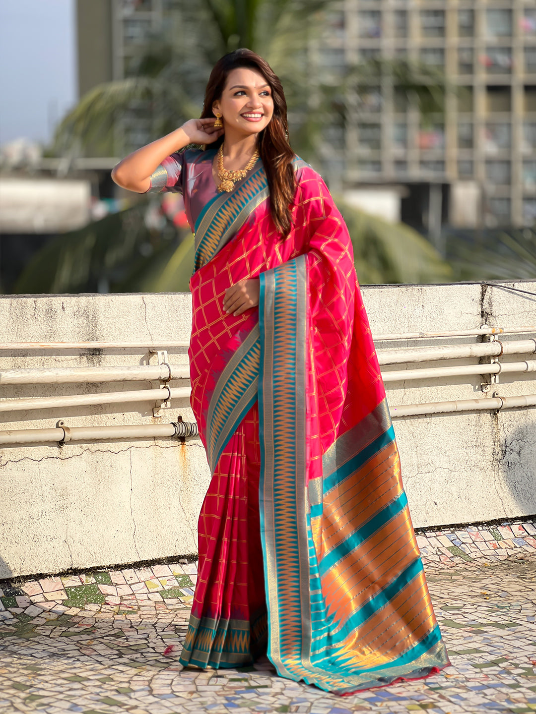 Pink soft silk checks traditional zari contrast woven saree
