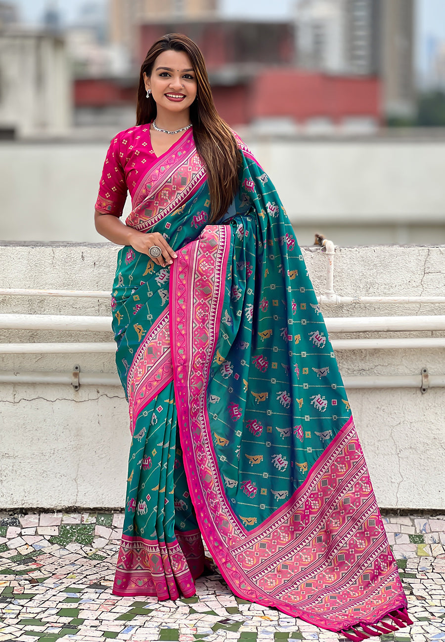 Green soft silk zari woven patola leheriya saree with contrast weaves