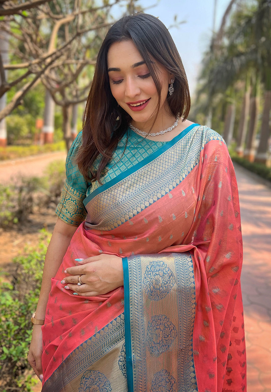 Coral pink kanchipuram tissue silk traditional zari woven saree