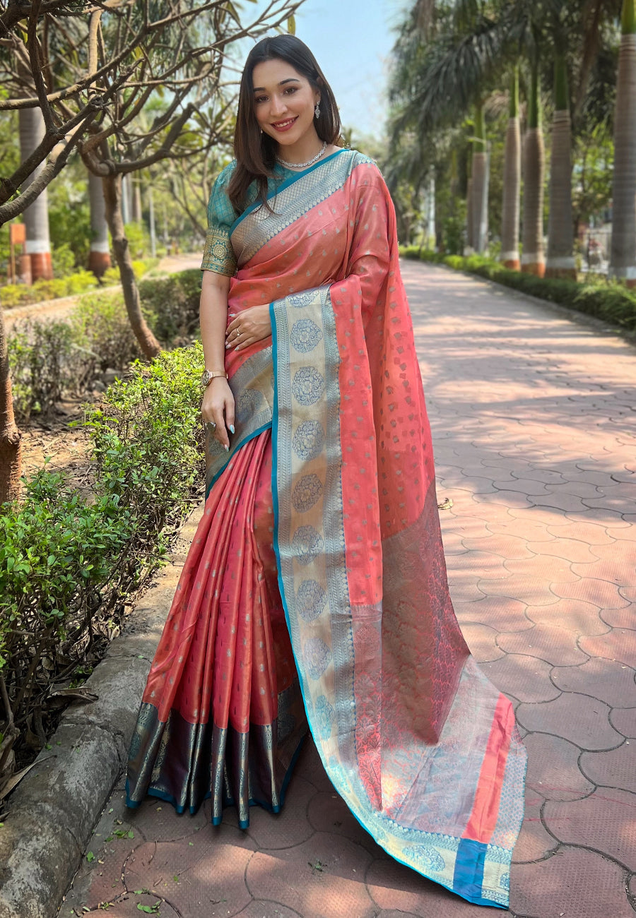 Coral pink kanchipuram tissue silk traditional zari woven saree