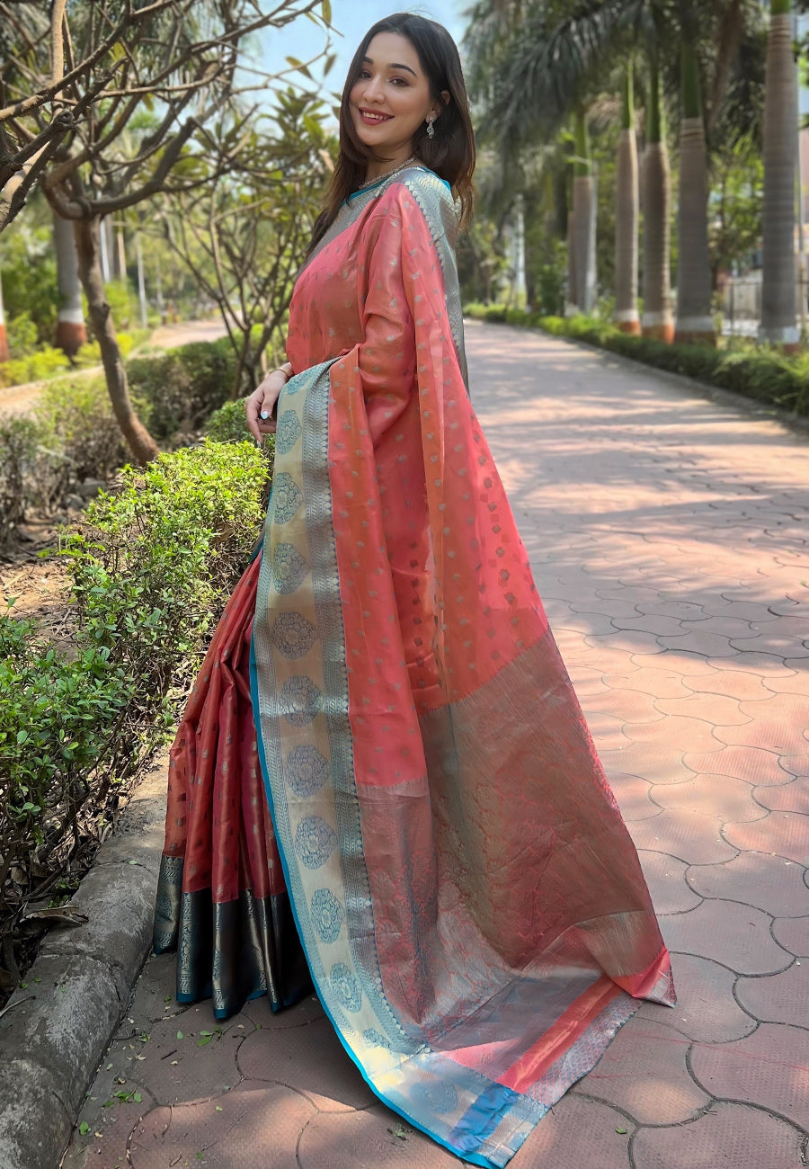 Coral pink kanchipuram tissue silk traditional zari woven saree