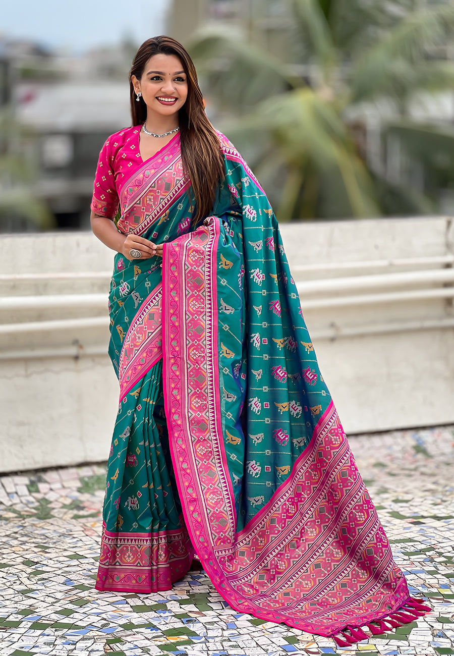 Green soft silk zari woven patola leheriya saree with contrast weaves