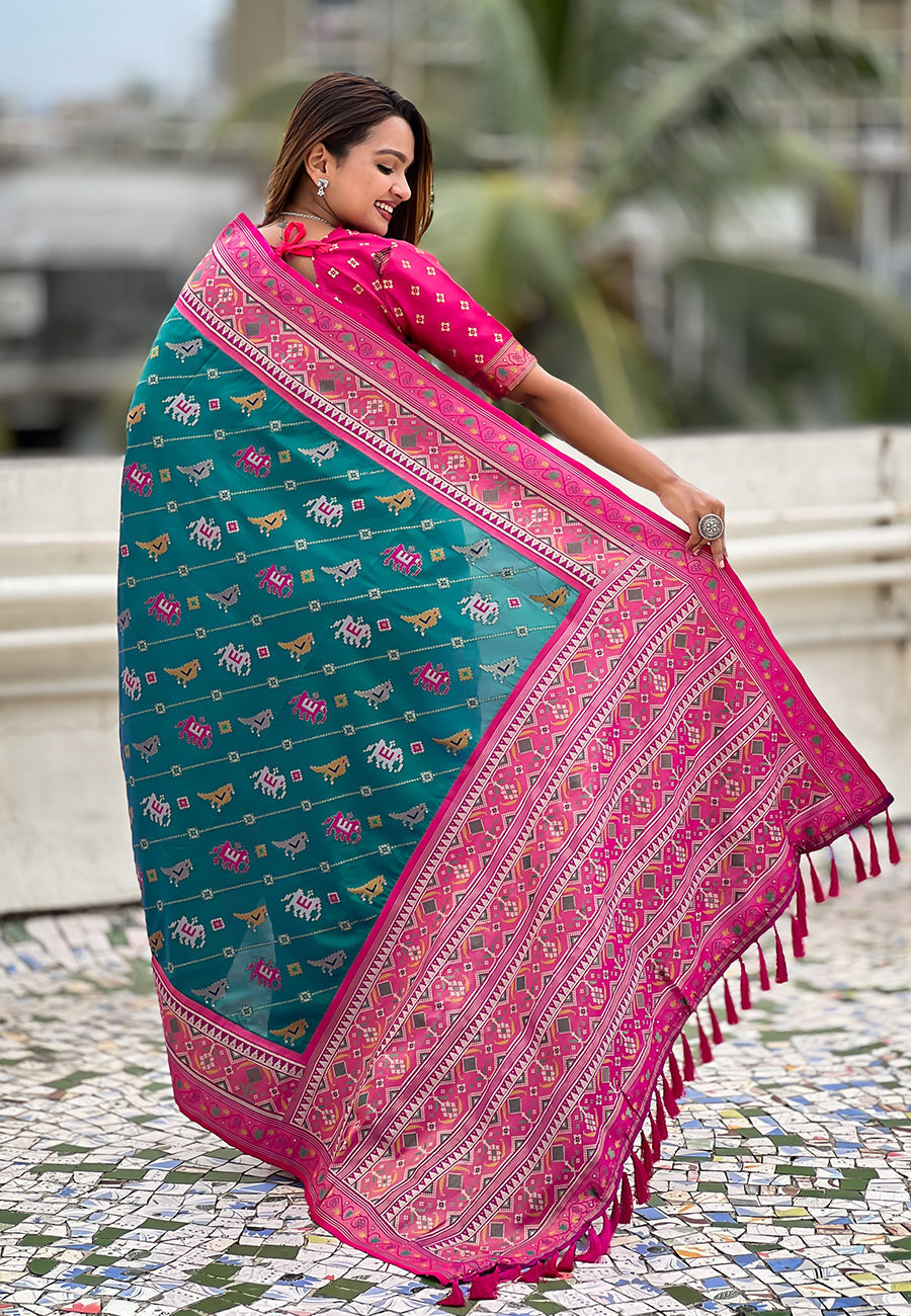 Green soft silk zari woven patola leheriya saree with contrast weaves