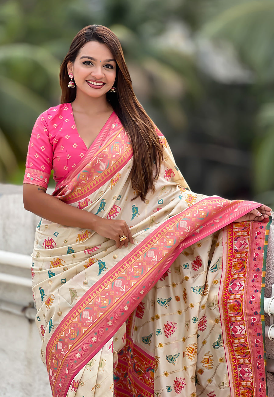 Cream soft silk zari woven patola leheriya saree with contrast weaves