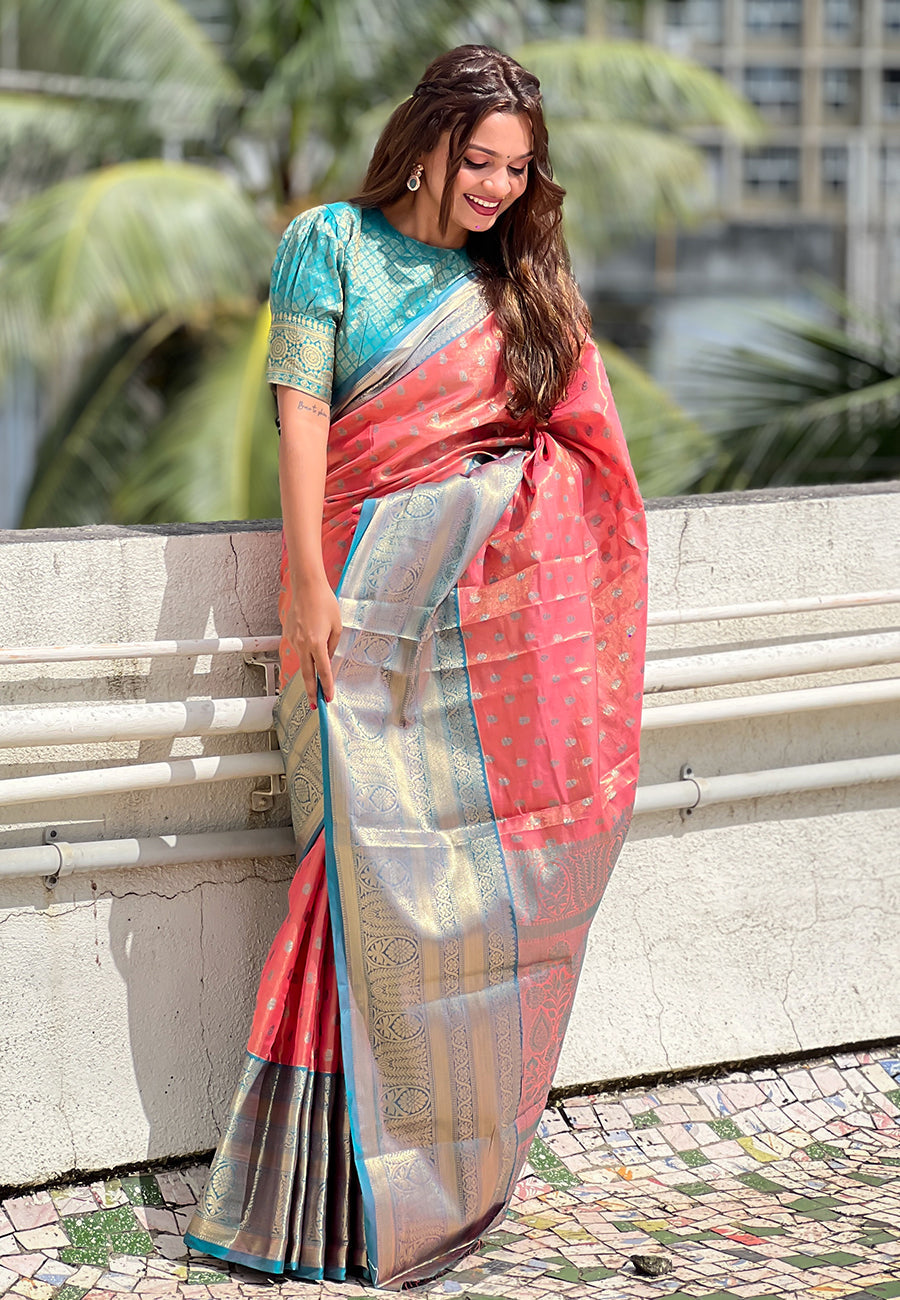 Peach kanjivaram tissue silk traditional zari woven saree