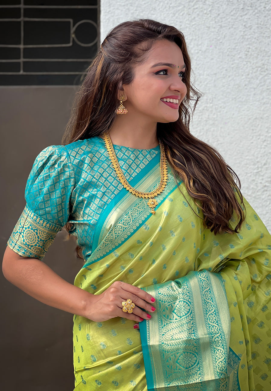 Green kanjivaram tissue silk traditional zari woven saree