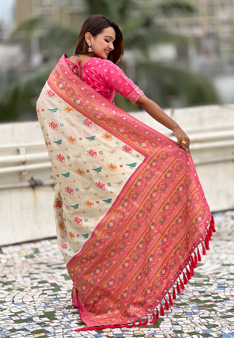 Cream soft silk zari woven patola leheriya saree with contrast weaves