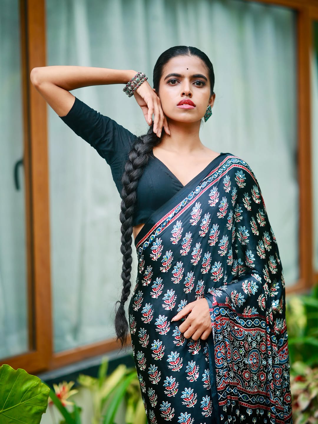 Midnight black pure modal silk saree with ajrakh inspired floral print heritage designer pall