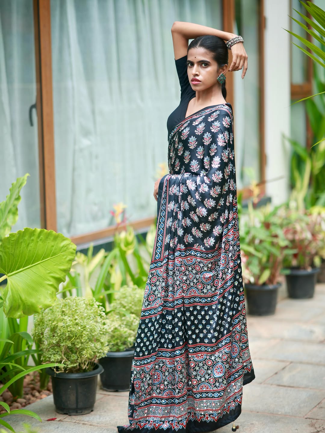 Midnight black pure modal silk saree with ajrakh inspired floral print heritage designer pall