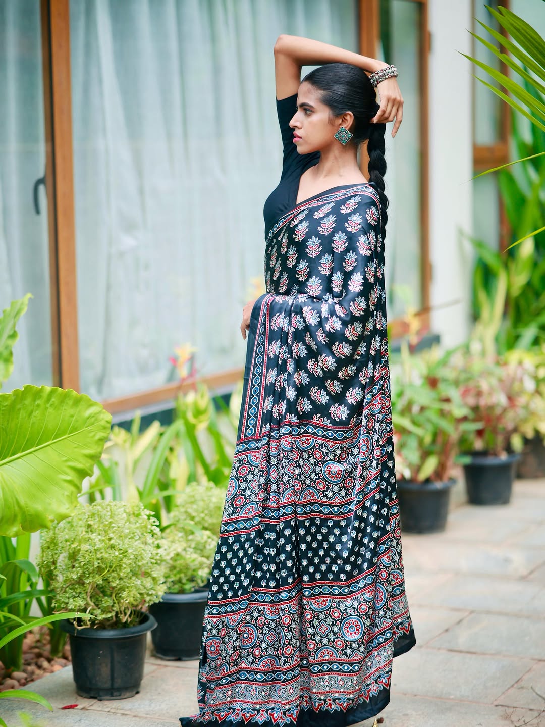 Midnight black pure modal silk saree with ajrakh inspired floral print heritage designer pall
