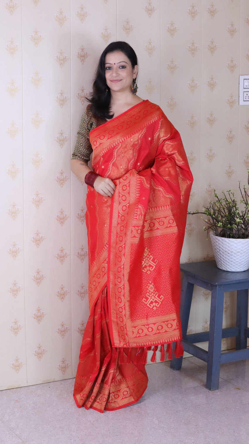 Pink soft silk bandhani leheriya zari woven saree