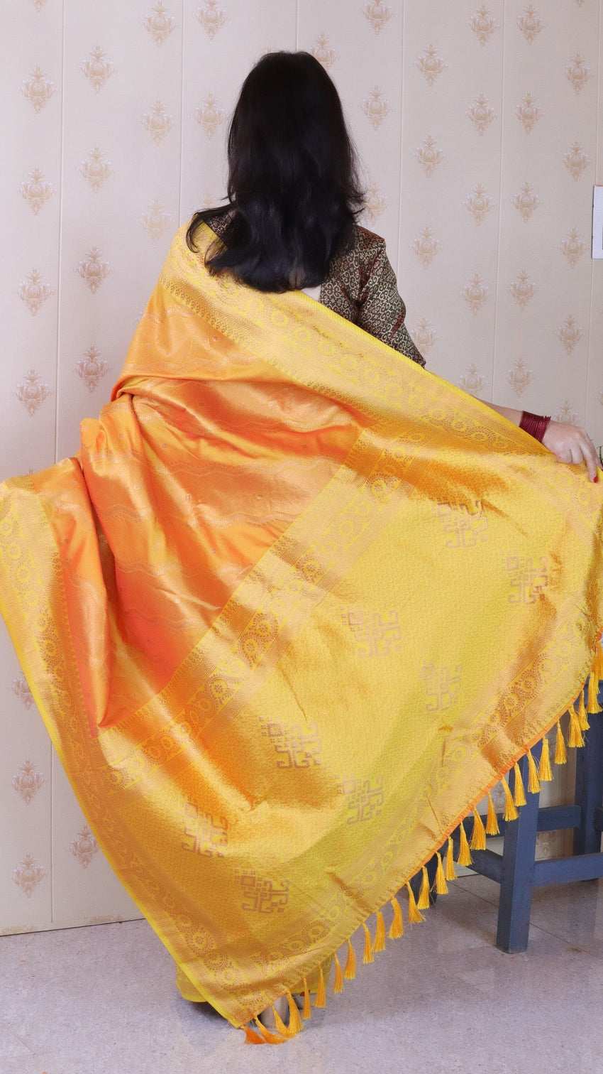 Orange soft silk bandhani leheriya zari woven saree