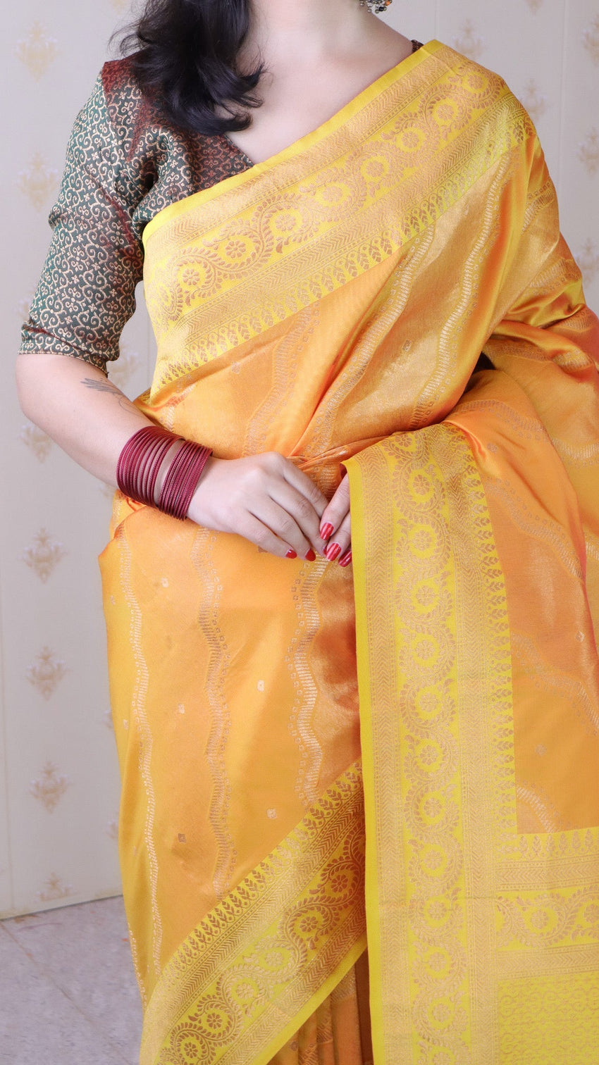Orange soft silk bandhani leheriya zari woven saree
