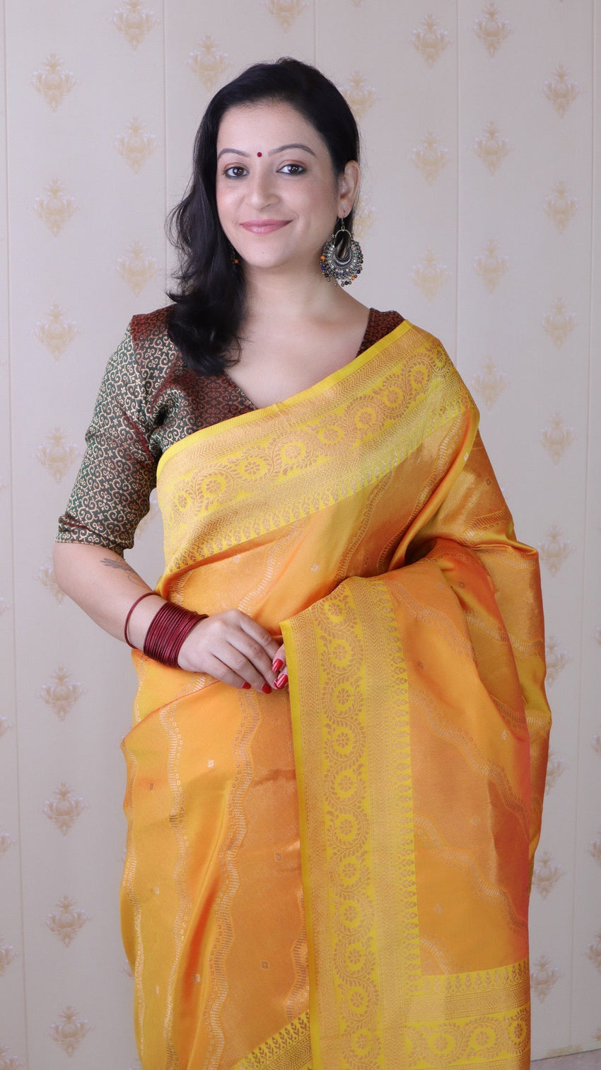 Orange soft silk bandhani leheriya zari woven saree