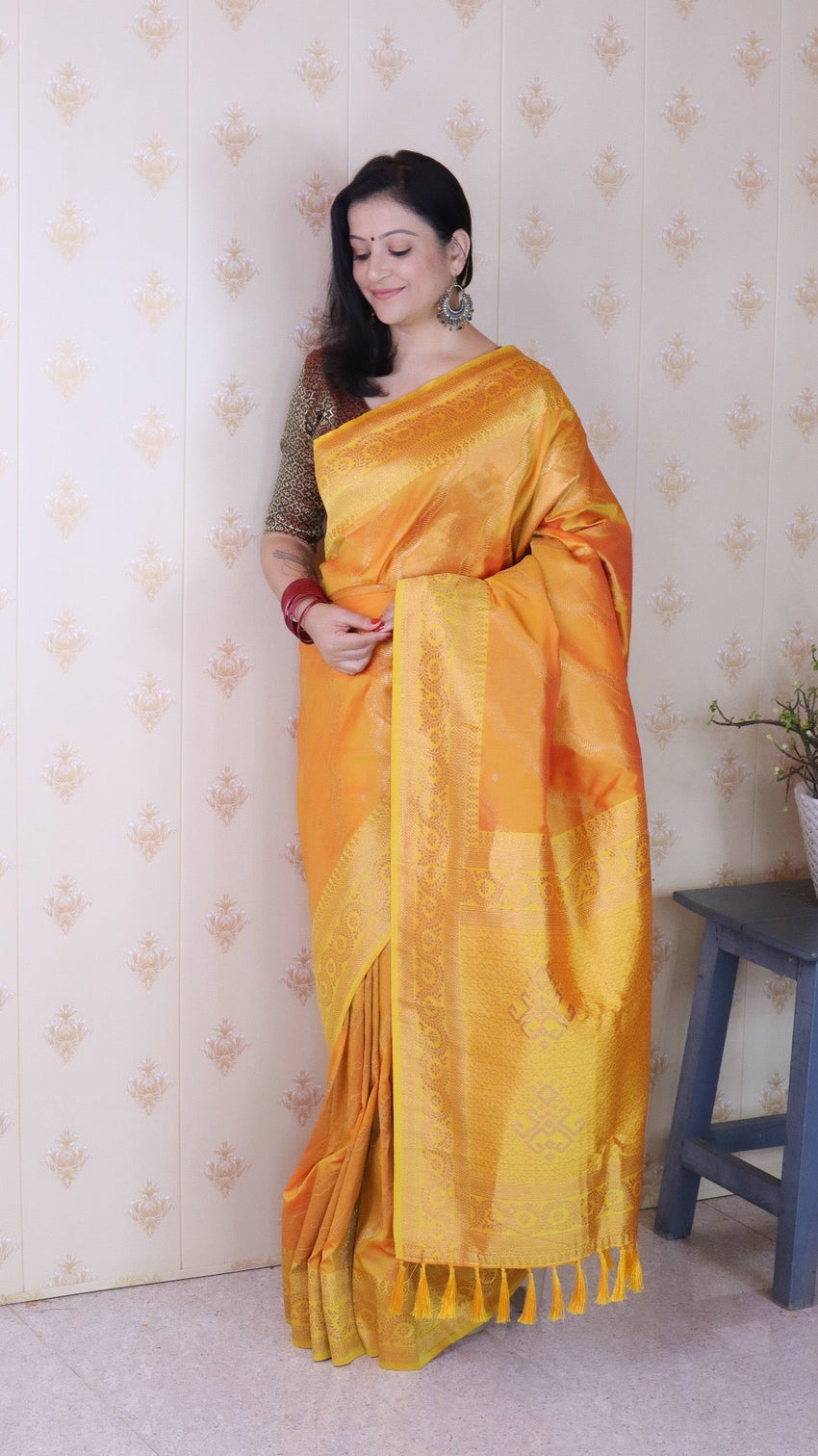 Orange soft silk bandhani leheriya zari woven saree