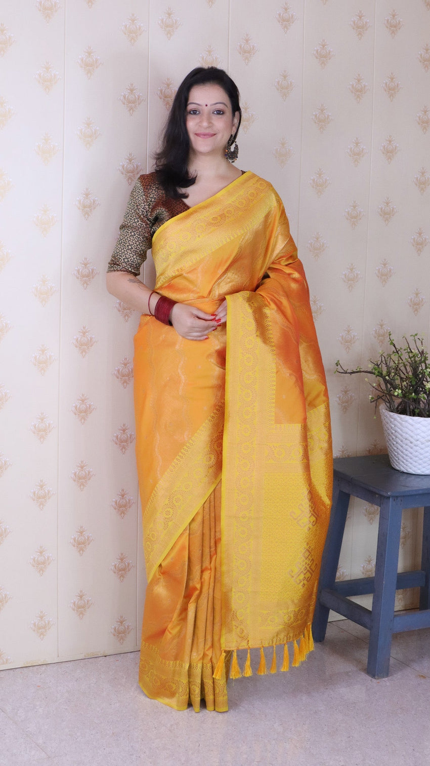 Orange soft silk bandhani leheriya zari woven saree