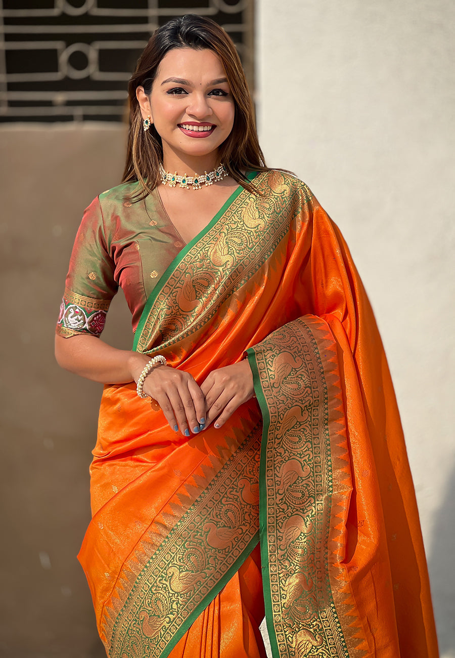 Orange pure tissue zari woven patola saree with contrast weaves