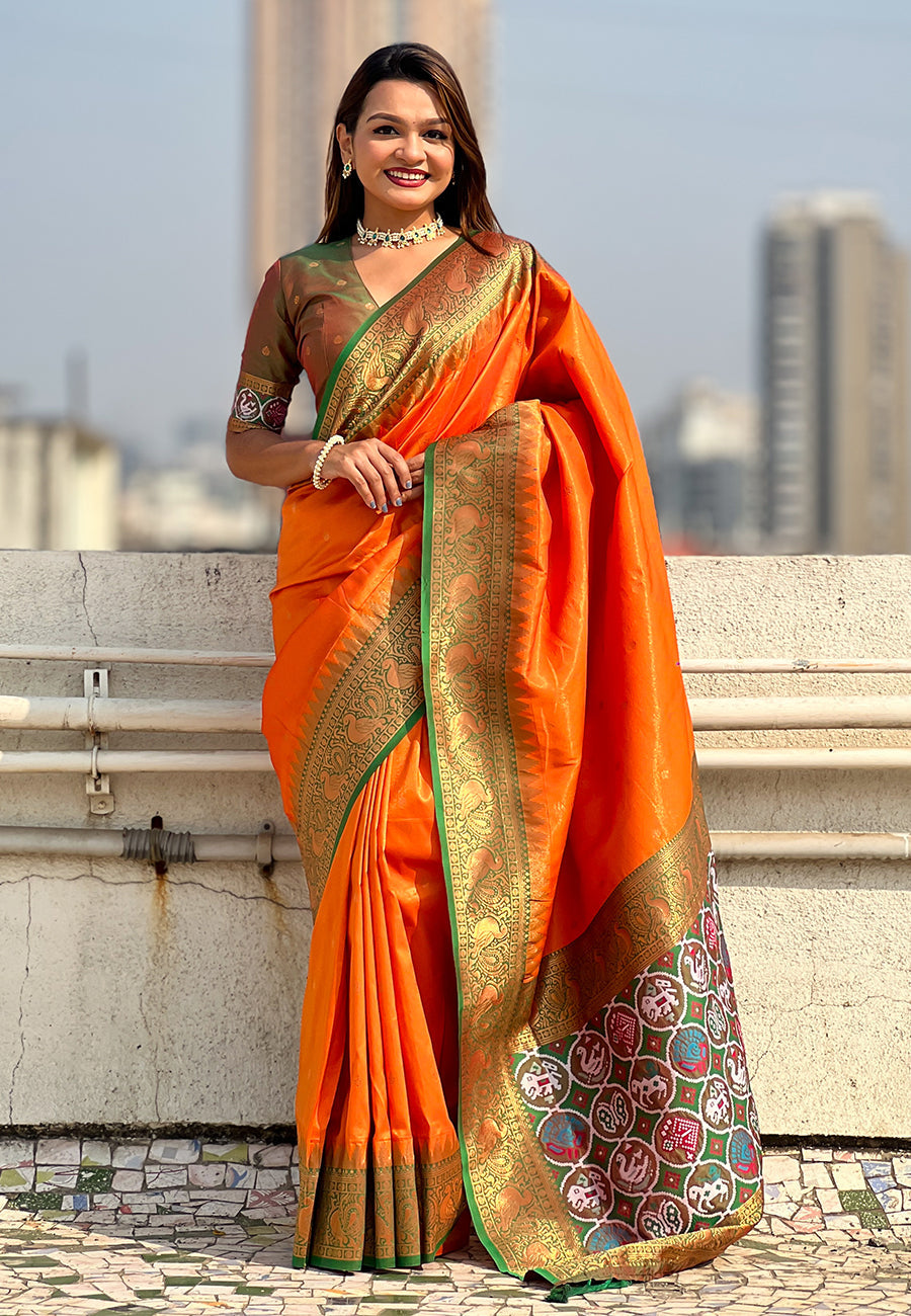 Orange pure tissue zari woven patola saree with contrast weaves