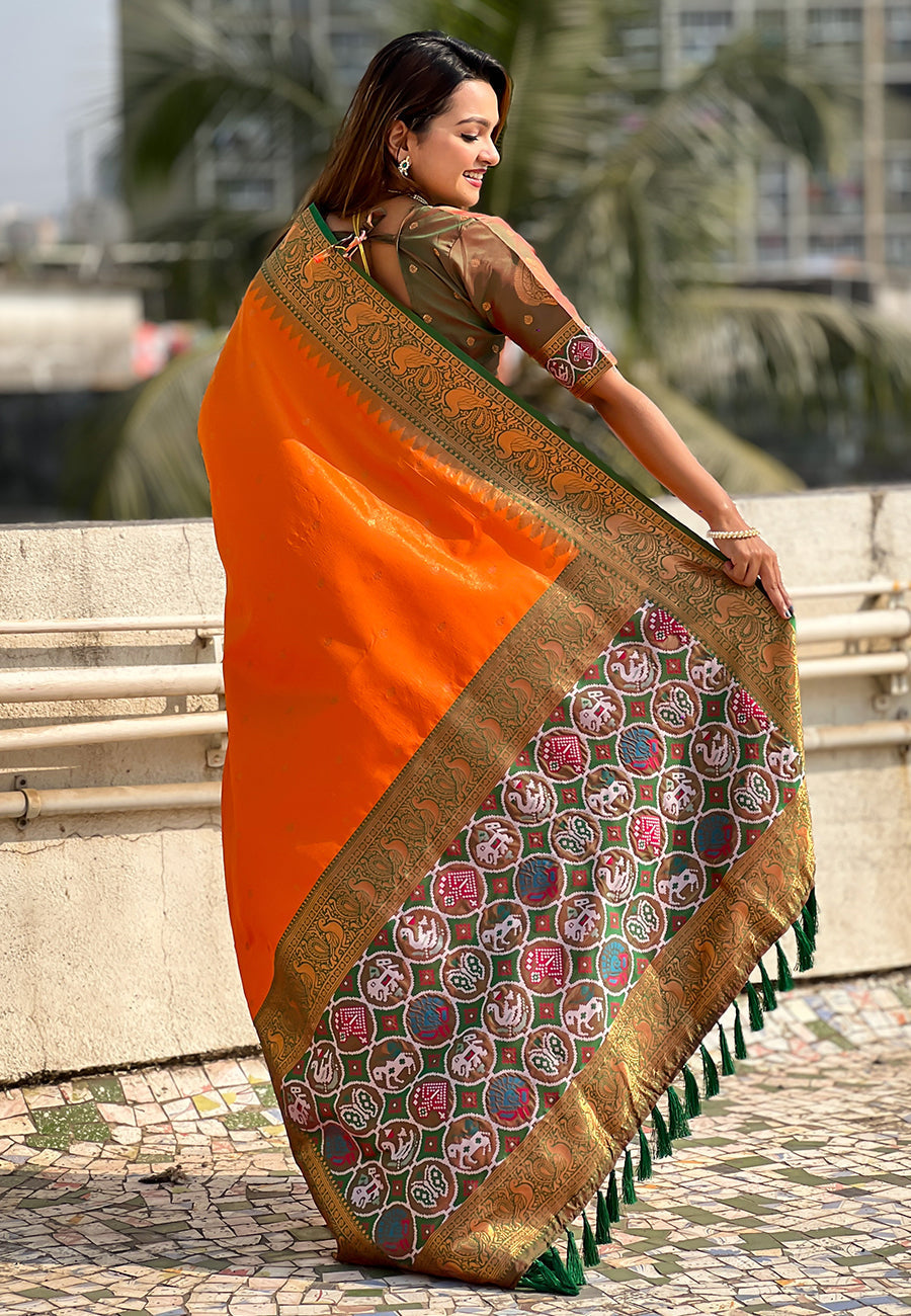 Orange pure tissue zari woven patola saree with contrast weaves